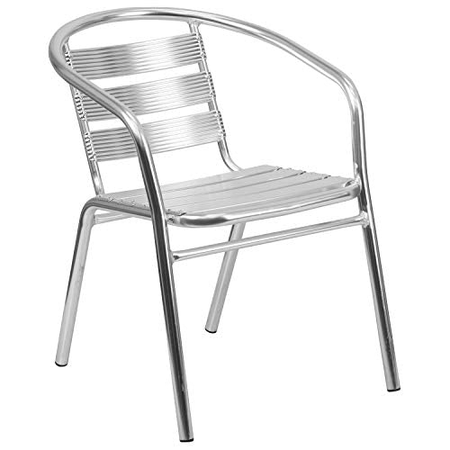 Commercial-grade black metal stack chair for frequent-use patio seating.